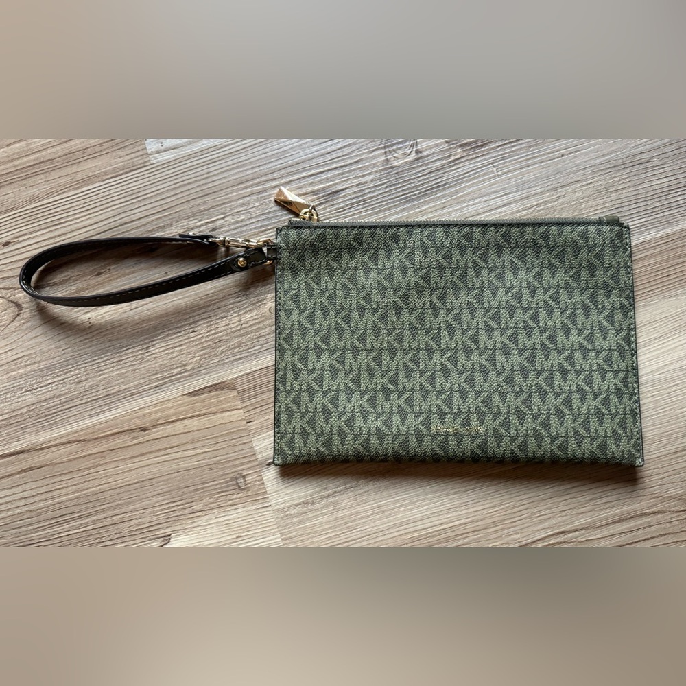 Michael Kors monogram clutch or wristlet